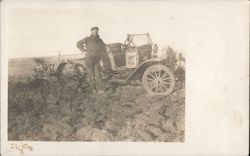 Man with Model T era car Postcard