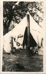 Cooking over a camp stove Postcard