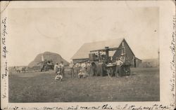 Farm workers with threshing machine, barn and grain Postcard