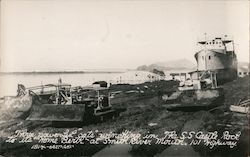 Caterpillar Tractors winching S.S. Castle Rock to it's "Home Berth" at Smith River Mouth 101 Highway California Postcard Postcar Postcard