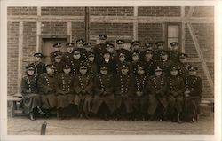 Group of Men in Uniforms - Police? Postcard