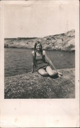 Girl in Bathing Suit - Sitting on a Rock in Front of Water Postcard