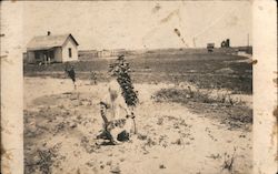 Girl and Cat In Front of House Built in 1914 Trousdale, KS Postcard Postcard Postcard