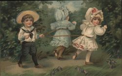 A Boy Holding Two Girls With a Leash Postcard