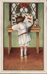 I Wish You a Jolly Christmas - Child Writing at Desk Postcard