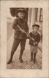 Two Young Boys Holding Real & Toy Guns Children Postcard Postcard Postcard