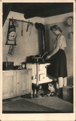 Woman Cooking at a Stove Postcard