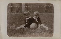 Two Boys Sitting on Lawn with Ball Children Postcard Postcard Postcard