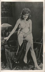 Woman Dressed in a Neglige "No. 7" Postcard