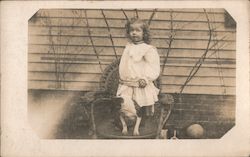 Young Girl on Wicker Chair with Dog Children Postcard Postcard Postcard