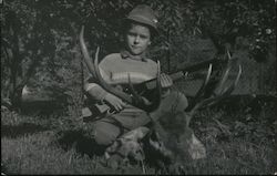 Boy with Rifle Sitting on Eight Point Buck Postcard