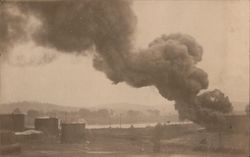 Oil Tank Fire, Lake or River in Background Postcard