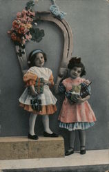 Two Girls Under a Horseshoe and Flowers Children Postcard Postcard Postcard