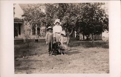 Three Children Wearing Hats in Yard Postcard Postcard Postcard