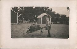 Girl in Dress with Wheelbarrow Postcard