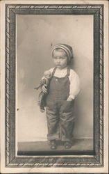 Young Boy with Baby Doll Postcard