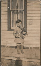 Young Child Holding Teddy Bear Postcard