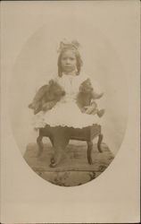 Girl in White Dress Holding Two Teddybears Postcard