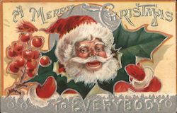 A Merry Christmas to Everybody - Santa holding holly leaves with berries Postcard