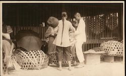 Chinese Workers with Large Woven Baskets and an Umbrella China Postcard Postcard Postcard