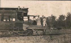 Women standing on Wrecked rain Disasters Postcard Postcard Postcard