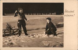 Stastne Vanoce (Merry Christmas in Slovak) -Young Boy and Girl having a Snowball Fight Postcard