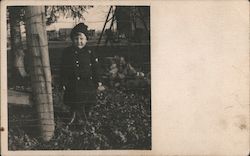 Boy Behind Wire Fence Postcard