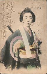 Japanase woman with typical dress and sword Postcard