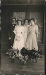 3 women and one man at Wedding Postcard