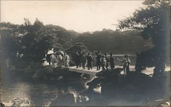 People on footbridge Postcard