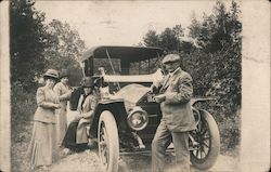 Women and Man Surrounding Early Model Automobile Postcard