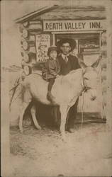 Child on Donkey With Man Behind Them at Photo Shop Death Valley, CA Postcard Postcard Postcard