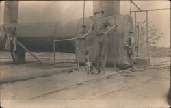 Man and a Dog at large Boiler Postcard