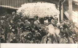 Children under parasol, parade float Postcard