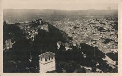 A view of Granada, showing the Alhambra Palace on the left Postcard