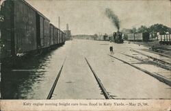 Katy Engine Moving Freight Cars from flood in Katy Yards May 25, 1908 Postcard