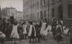 Children Dancing to Organ Postcard