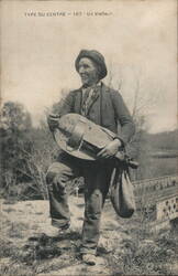 French Hurdy Gurdy Player Postcard