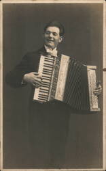 Smiling Man Playing Accordion Postcard