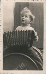 Boy Playing Accordion Postcard