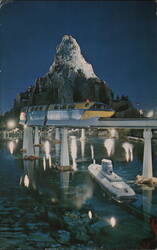 Disneyland Monorail Matterhorn Mountain at Night Anaheim, CA Postcard Postcard Postcard