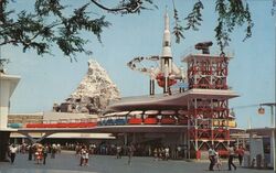 Tomorrowland, Disneyland, Rocket Jets, Matterhorn, People Mover Postcard