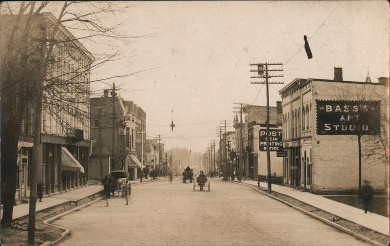 Main St. Looking East from Lane St. Horse Wagons Hudson, MI Postcard