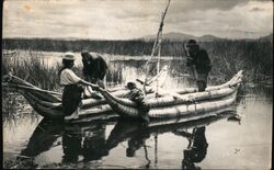 Bolivian Natives Crafting Balsa Wood Boats on Lake Titicaca Postcard