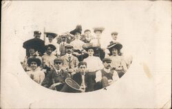 Group of people posing with badminton paddle Postcard