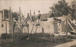 Workings building home with stone blocks Postcard