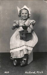 Young Girl Dressed in Dutch Outfit Holding Coffee Grinder Postcard