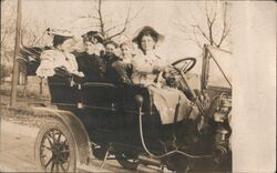 Ladies in an open top early automobile Cars Postcard Postcard Postcard