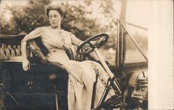 Victorian Woman Sitting Behind Steering Wheel of Car Postcard