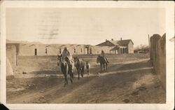 People Riding Donkeys in Pueblo Postcard